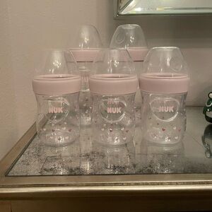 5 NUK Simply Natural bottles! (2) 9oz bottles and (3) 5oz bottles.